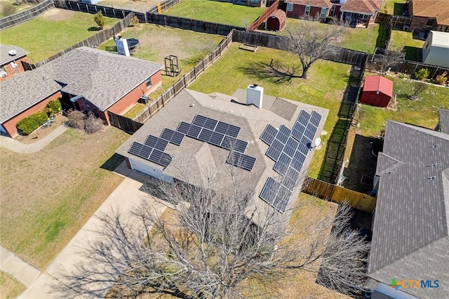 birds eye view of property with a residential view