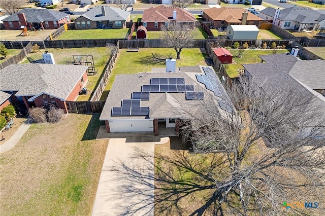 birds eye view of property with a residential view