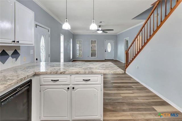 kitchen featuring black dishwasher, white cabinetry, dark wood finished floors, and ornamental molding