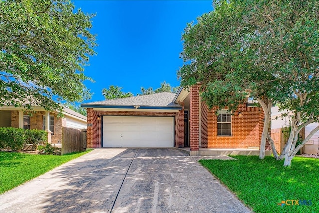 10122 Divine Breeze, San Antonio, TX 78251 - view of front facade with driveway, an attached garage, and brick siding