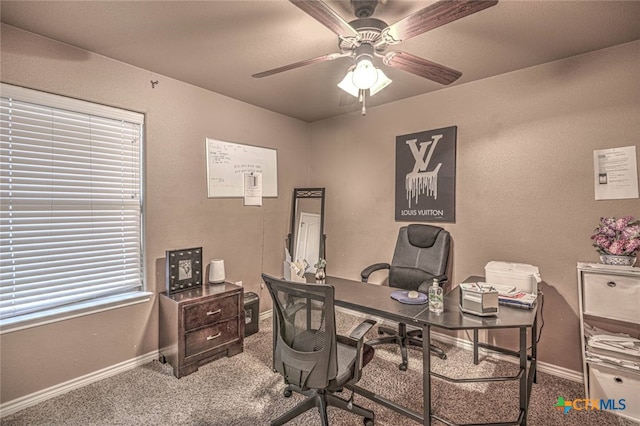 office featuring carpet floors and ceiling fan