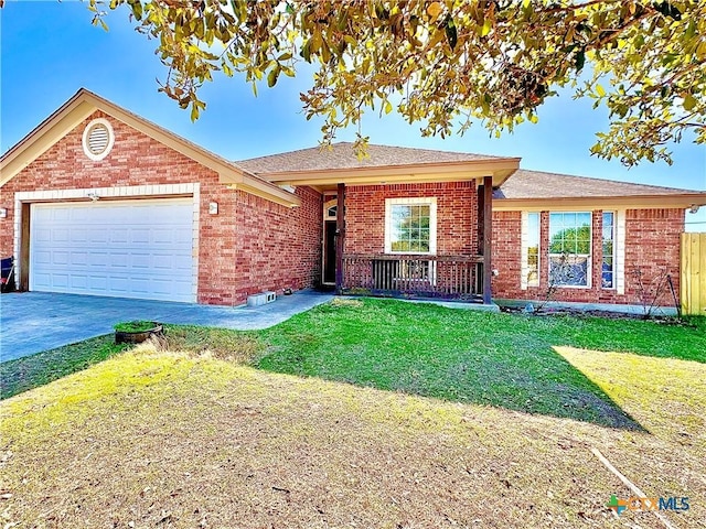 ranch-style house with a garage and a front lawn