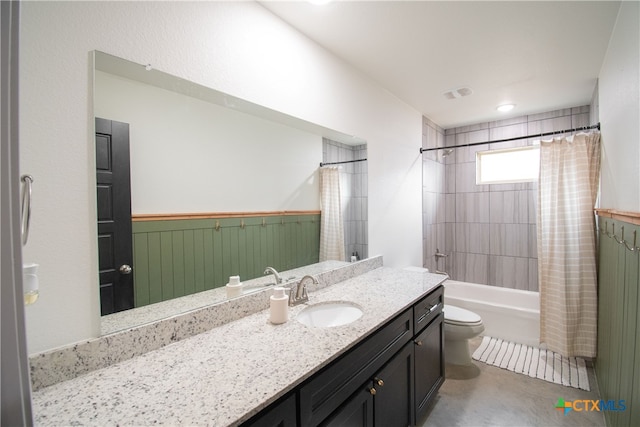 full bathroom featuring concrete flooring, vanity, shower / bath combo, and toilet