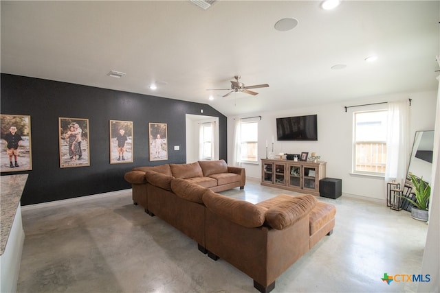 living room featuring lofted ceiling and ceiling fan