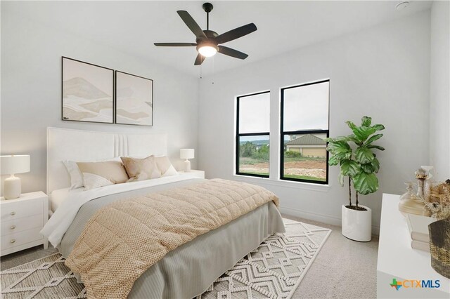 1123 Vintage Way, New Braunfels, TX 78132 - bedroom with light colored carpet and ceiling fan