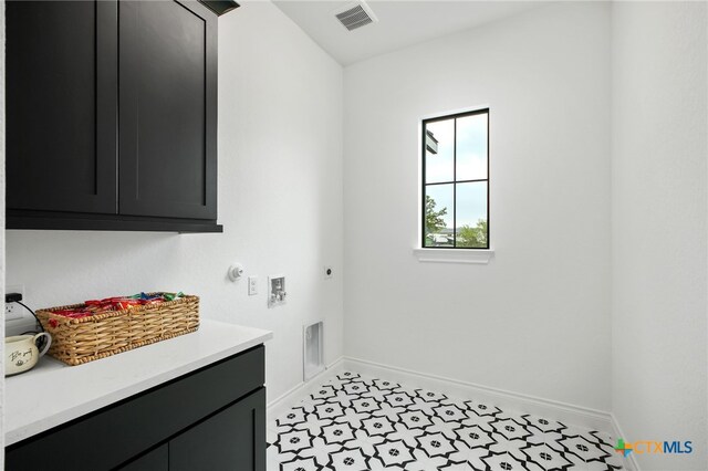 1123 Vintage Way, New Braunfels, TX 78132 - washroom with cabinet space, hookup for a gas dryer, electric dryer hookup, and hookup for a washing machine