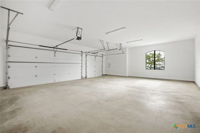 1123 Vintage Way, New Braunfels, TX 78132 - garage featuring a garage door opener