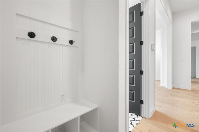1123 Vintage Way, New Braunfels, TX 78132 - mudroom featuring light wood-type flooring and baseboards