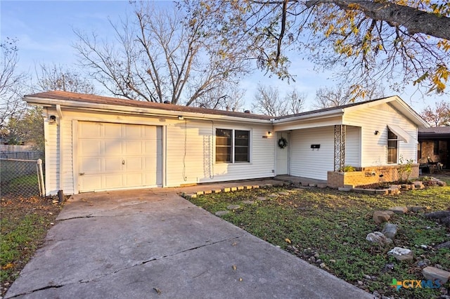 single story home featuring a garage