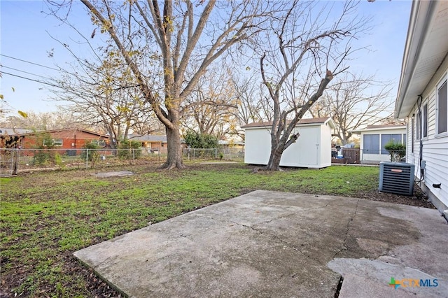 view of yard featuring a patio, a shed, and cooling unit