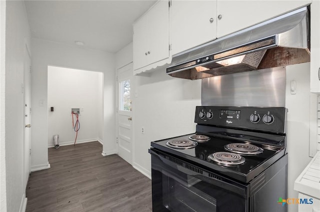 kitchen with white cabinetry, black electric range oven, and dark hardwood / wood-style floors