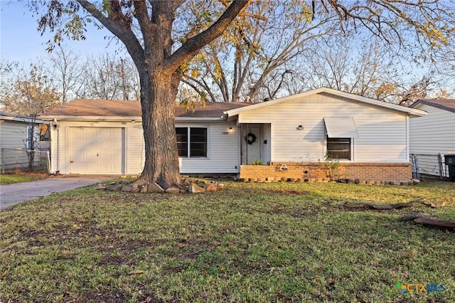 ranch-style house with a front lawn and a garage