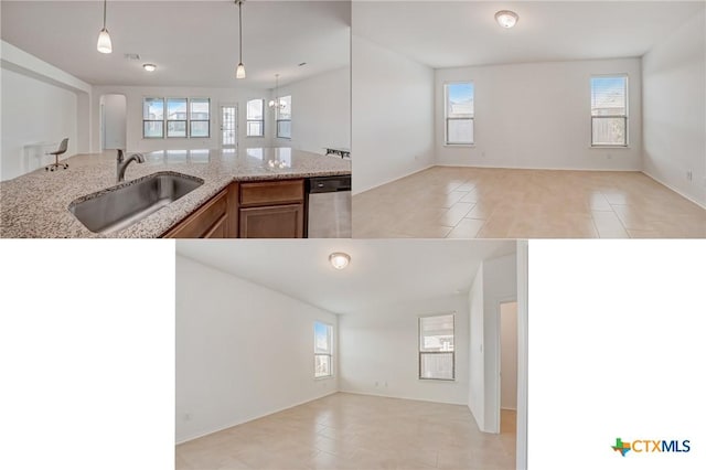 kitchen featuring dishwasher, sink, pendant lighting, and light tile patterned floors