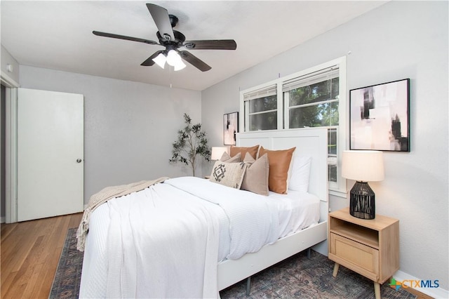 1902 S 41st St, Temple, TX 76504 - bedroom with wood finished floors and a ceiling fan