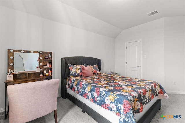 427 Bluejack Way, Hutto, TX 78634 - carpeted bedroom with lofted ceiling and baseboards