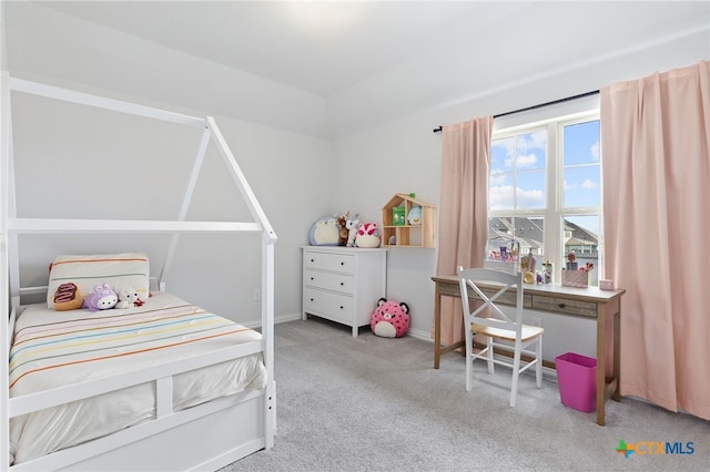 427 Bluejack Way, Hutto, TX 78634 - carpeted bedroom featuring baseboards