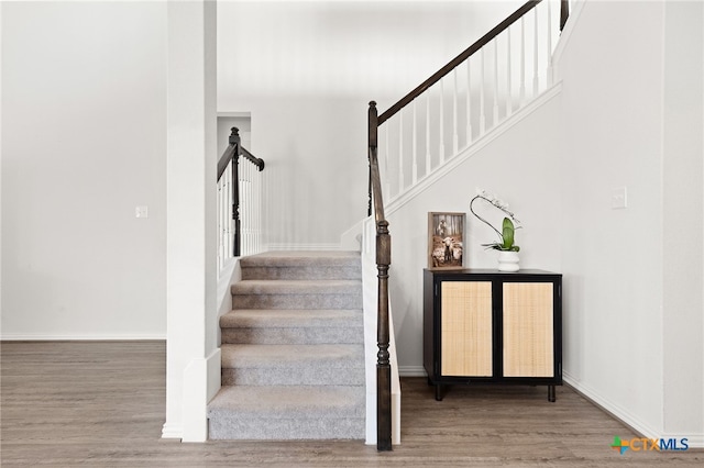 427 Bluejack Way, Hutto, TX 78634 - stairway with wood finished floors and baseboards