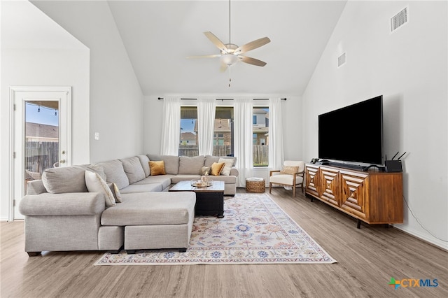 427 Bluejack Way, Hutto, TX 78634 - living room with ceiling fan, wood finished floors, and high vaulted ceiling