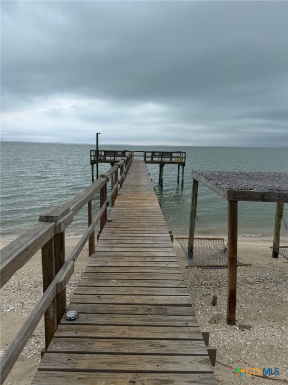 view of dock with a water view