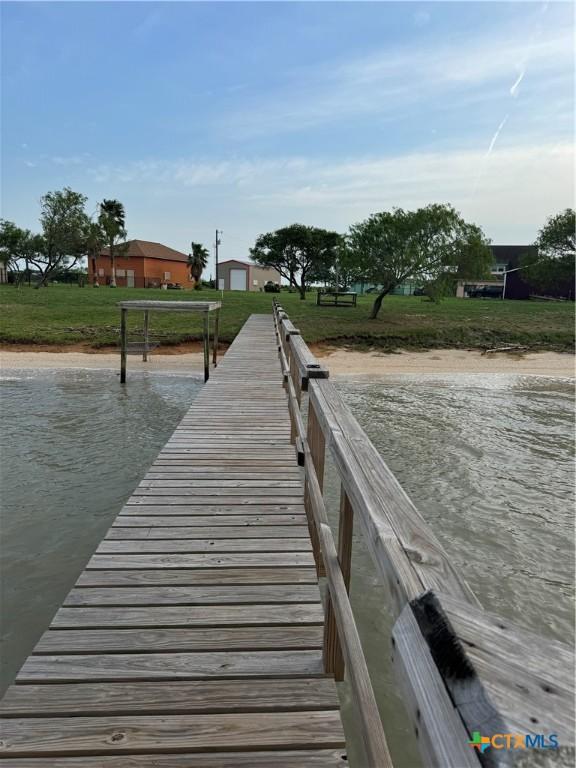 dock area featuring a yard