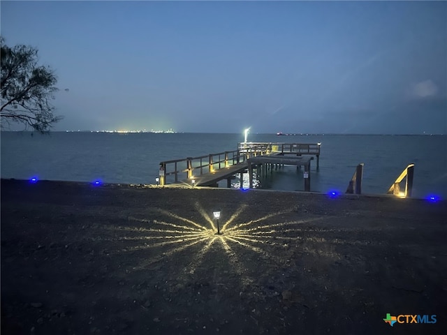 view of dock with a water view