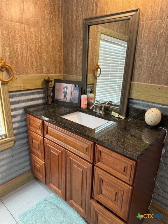 bathroom with vanity and tile patterned flooring