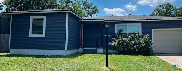 single story home with a garage and a front yard