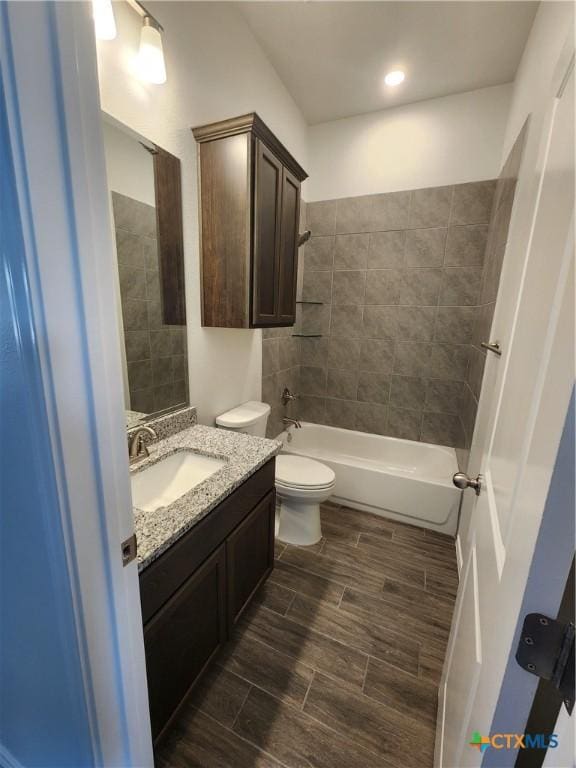6002 Monza Dr, Temple, TX 76502 - full bath featuring vanity, wood finished floors, and bathing tub / shower combination