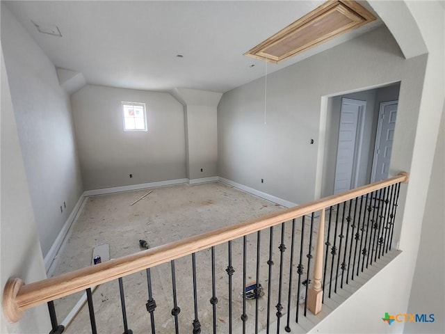 bonus room with vaulted ceiling