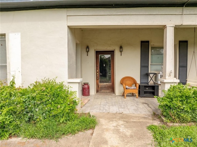740 Old Georgetown Rd, Gatesville, TX 76528 - view of home's exterior with stucco siding, central AC, an outbuilding, and a storage unit
