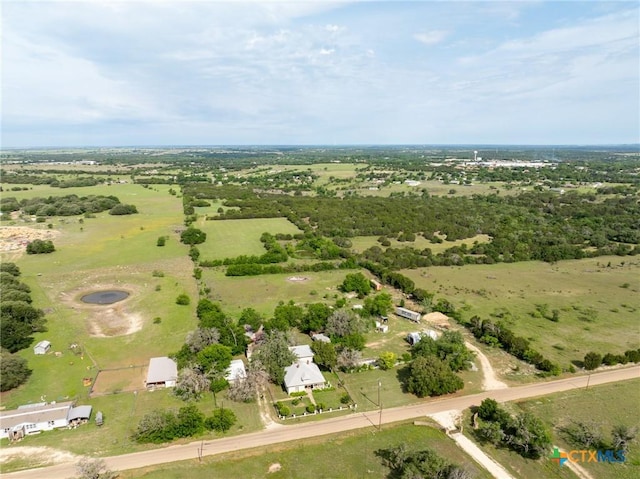 740 Old Georgetown Rd, Gatesville, TX 76528 - view of grassy yard featuring a shed, an outbuilding, and a garage