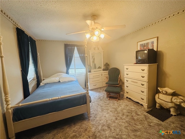 carpeted bedroom with a textured ceiling and ceiling fan