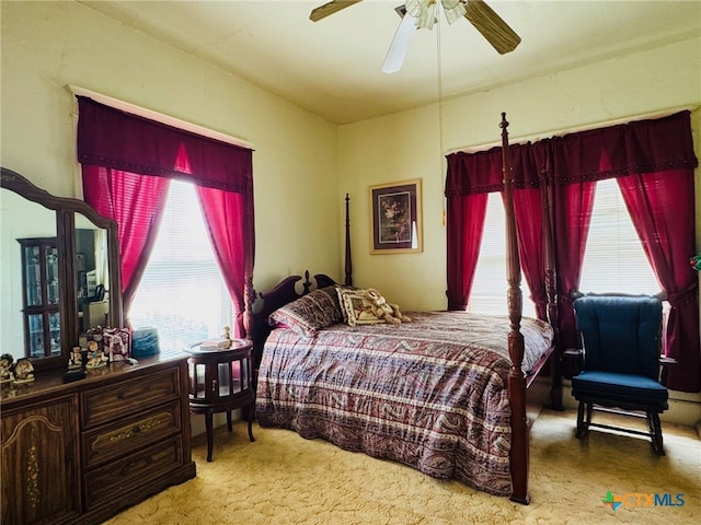 bedroom featuring carpet and a ceiling fan