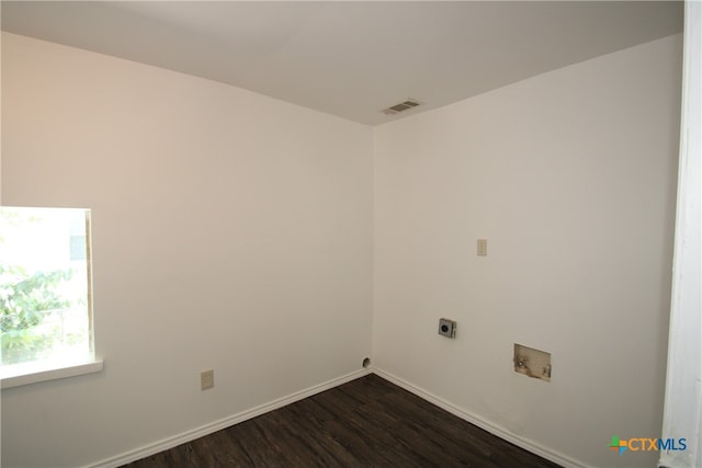 washroom featuring dark wood-type flooring, electric dryer hookup, and washer hookup