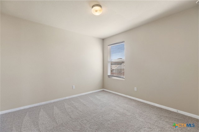 13512 Kearns Dr, Pflugerville, TX 78660 - unfurnished room featuring baseboards and carpet