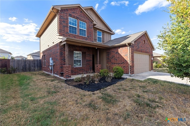 view of front of home with a garage and a front yard