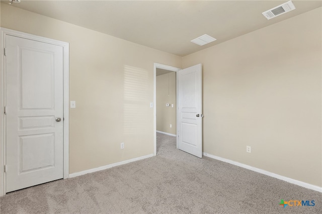 13512 Kearns Dr, Pflugerville, TX 78660 - unfurnished bedroom with carpet floors and baseboards