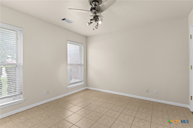 2207 Merle Dr, Copperas Cove, TX 76522 - unfurnished room featuring a ceiling fan and light tile patterned flooring