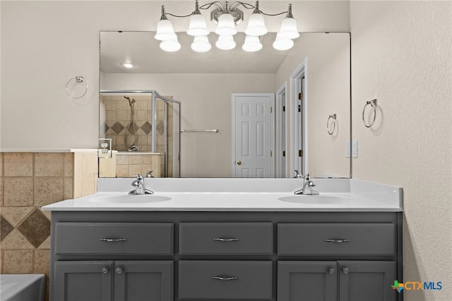 2207 Merle Dr, Copperas Cove, TX 76522 - bathroom featuring double vanity, a shower stall, and a bath