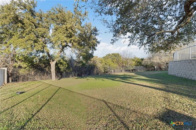 view of yard featuring fence