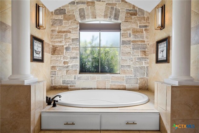 9864 Sendera Dr, Belton, TX 76513 - bathroom with a bath and ornate columns