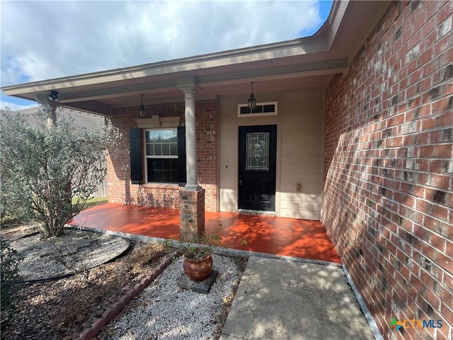 entrance to property with a porch