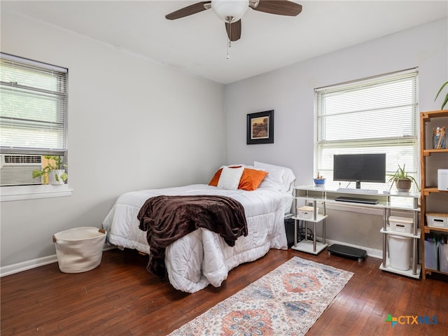 415 Brooks Mill Rd, Bertram, TX 78605 - bedroom featuring wood-type flooring, cooling unit, and ceiling fan