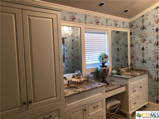 bathroom with vanity and crown molding