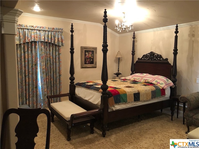 bedroom featuring carpet flooring, ornamental molding, and a chandelier