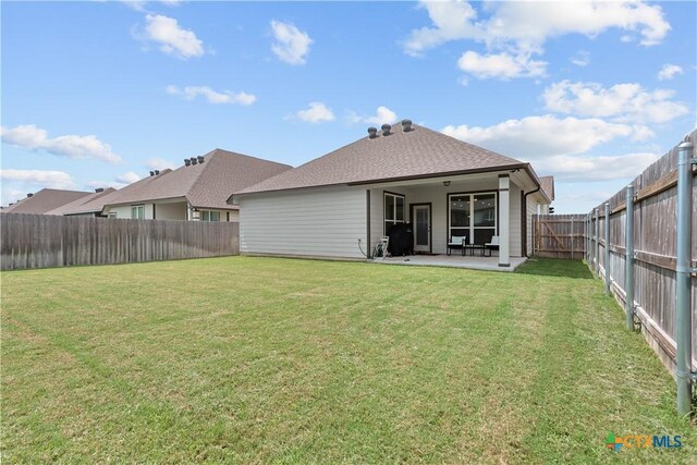 7005 Mcgregor Loop, Killeen, TX 76549 - rear view of house featuring a patio area, a fenced backyard, and roof with shingles