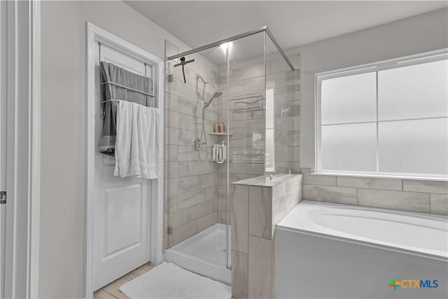7005 Mcgregor Loop, Killeen, TX 76549 - full bath featuring a garden tub and a shower stall