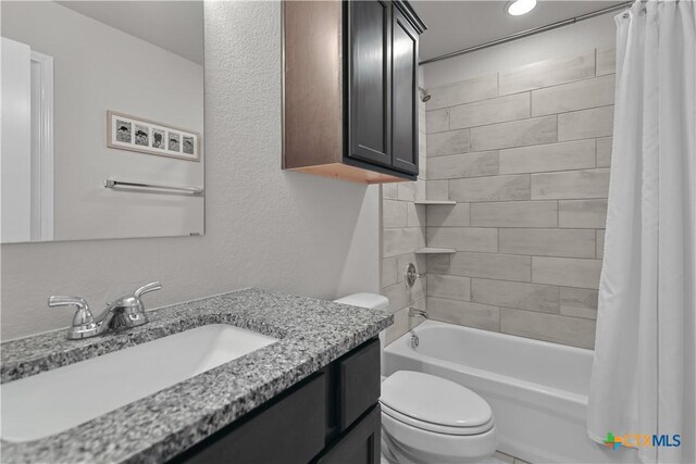 7005 Mcgregor Loop, Killeen, TX 76549 - full bathroom featuring shower / bath combo with shower curtain and vanity