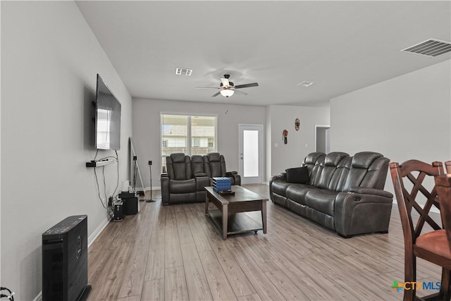 7005 Mcgregor Loop, Killeen, TX 76549 - living area featuring a ceiling fan and light wood-style flooring