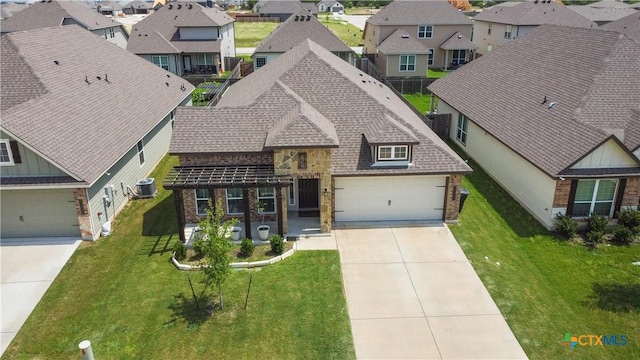 7005 Mcgregor Loop, Killeen, TX 76549 - view of front of home featuring brick siding, a residential view, and driveway